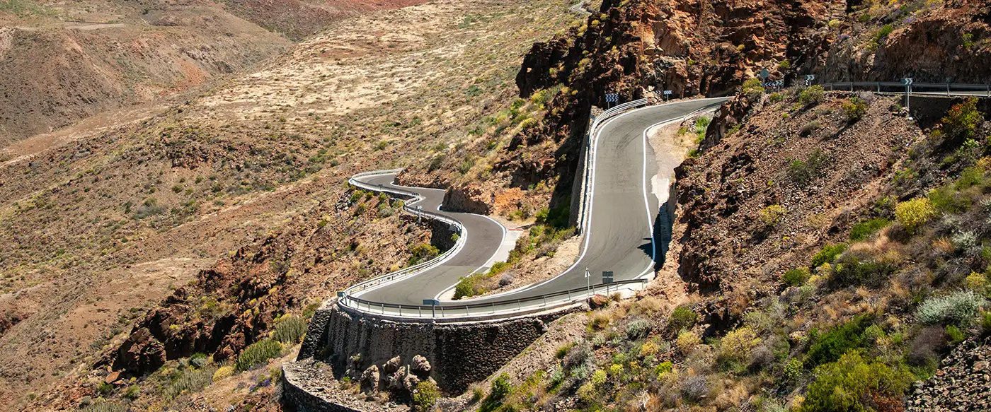 Hairpin bends winding up a mountain road in the south-east of Gran Canaria